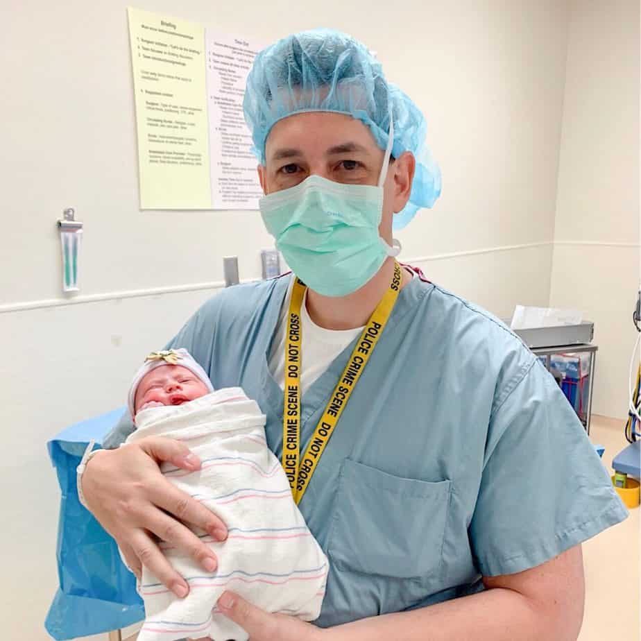 New dad holding new baby