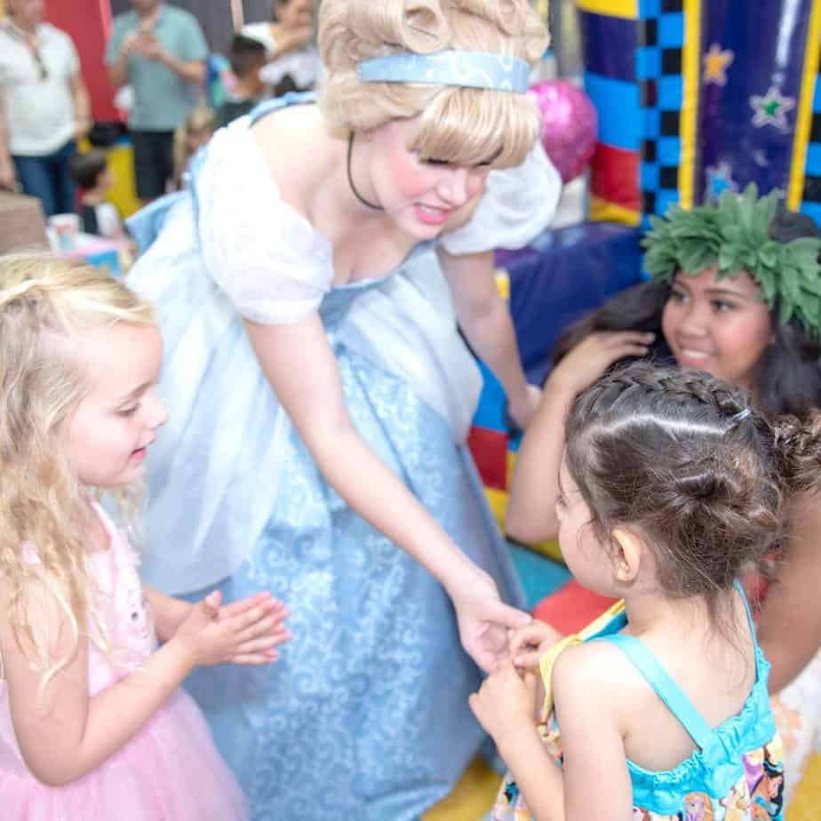 Lady dressed as Cinderella greeting my daughter at her 4th birthday party