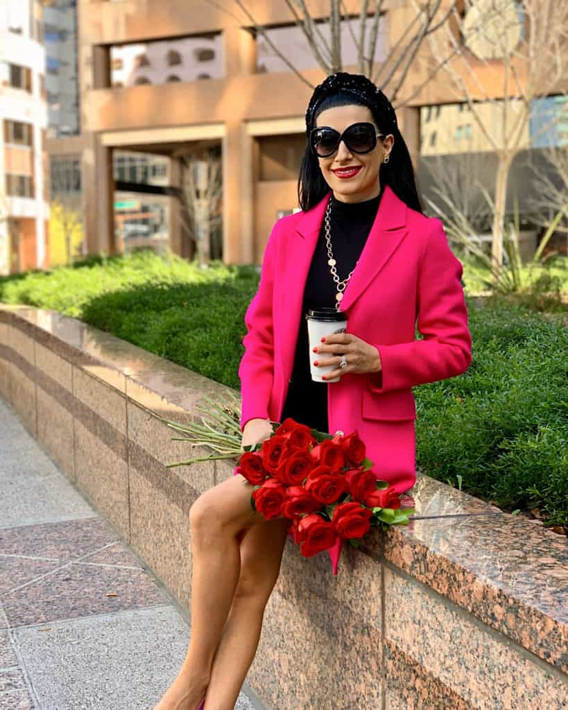 Valentine's Day outfit with pink coat with red roses