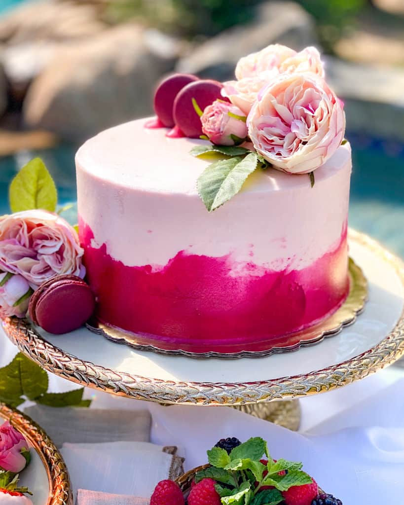 Dessert Table Design Tips - pink cake centerpiece