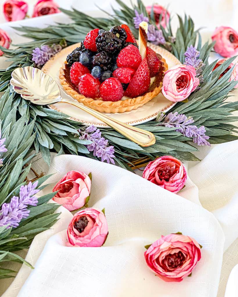 Fruit tart with flower decorations