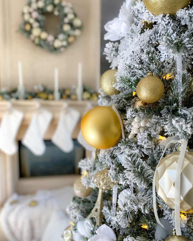 White and Gold Christmas decorations - bauble on tree and white stockings