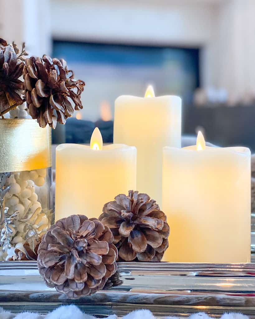 Make Your Home Feel Cozy: candles and pine cone decorations