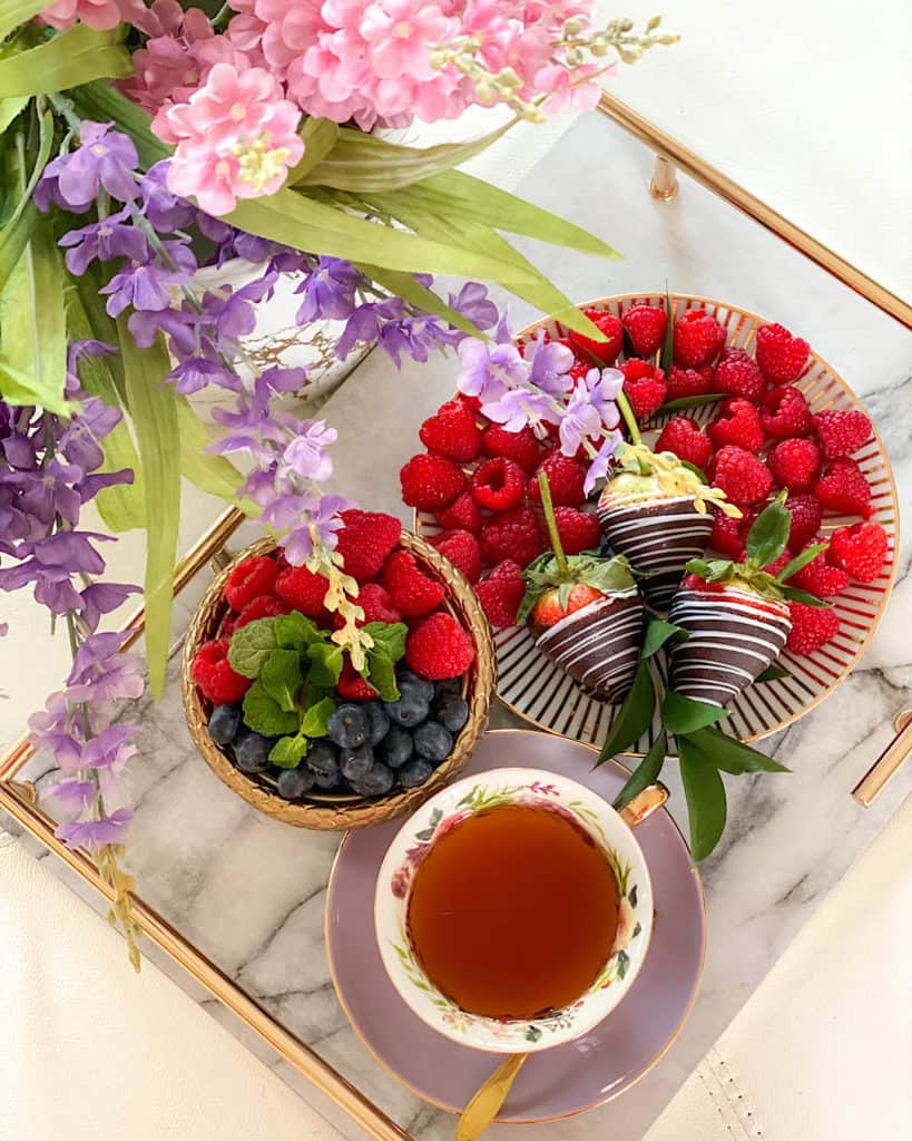 Afternoon Tea serveware with flowers and bright fruits