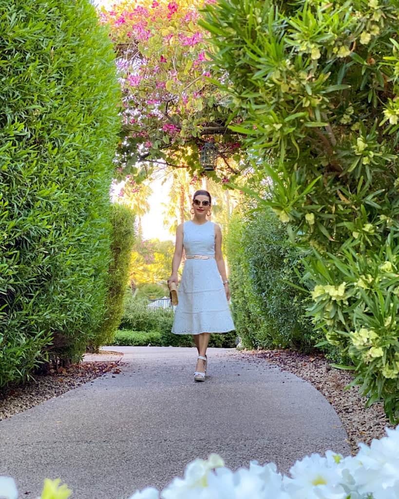 White summer dress styled with white shoes and gold belt