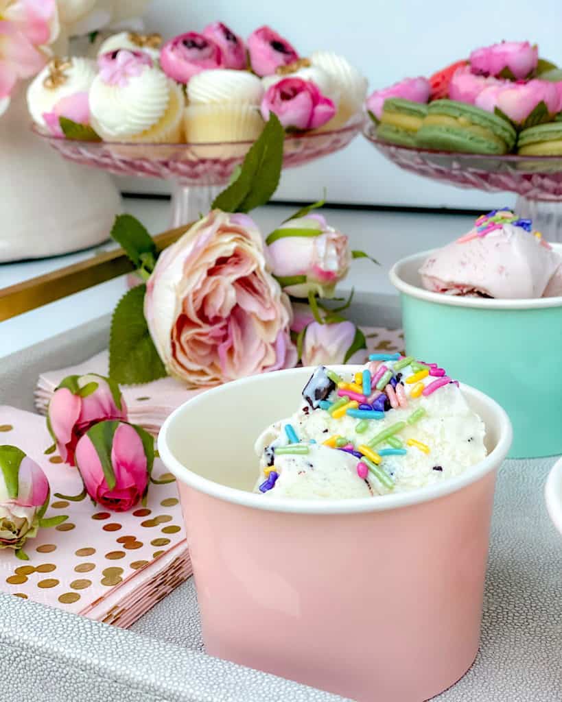 Ice cream in a bowl with colorful toppings