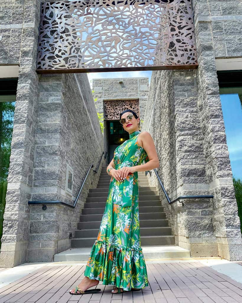 Lady in green dress standing at Avania Spa entrance at Hyatt Regency Scottsdale Arizona