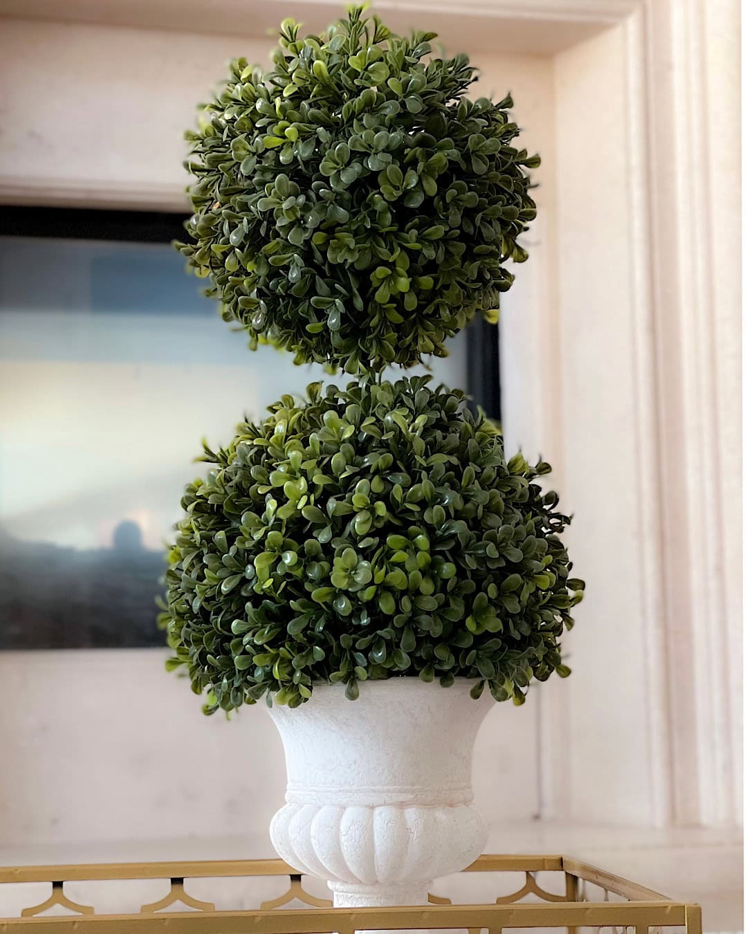 3- Faux boxwood topiaries