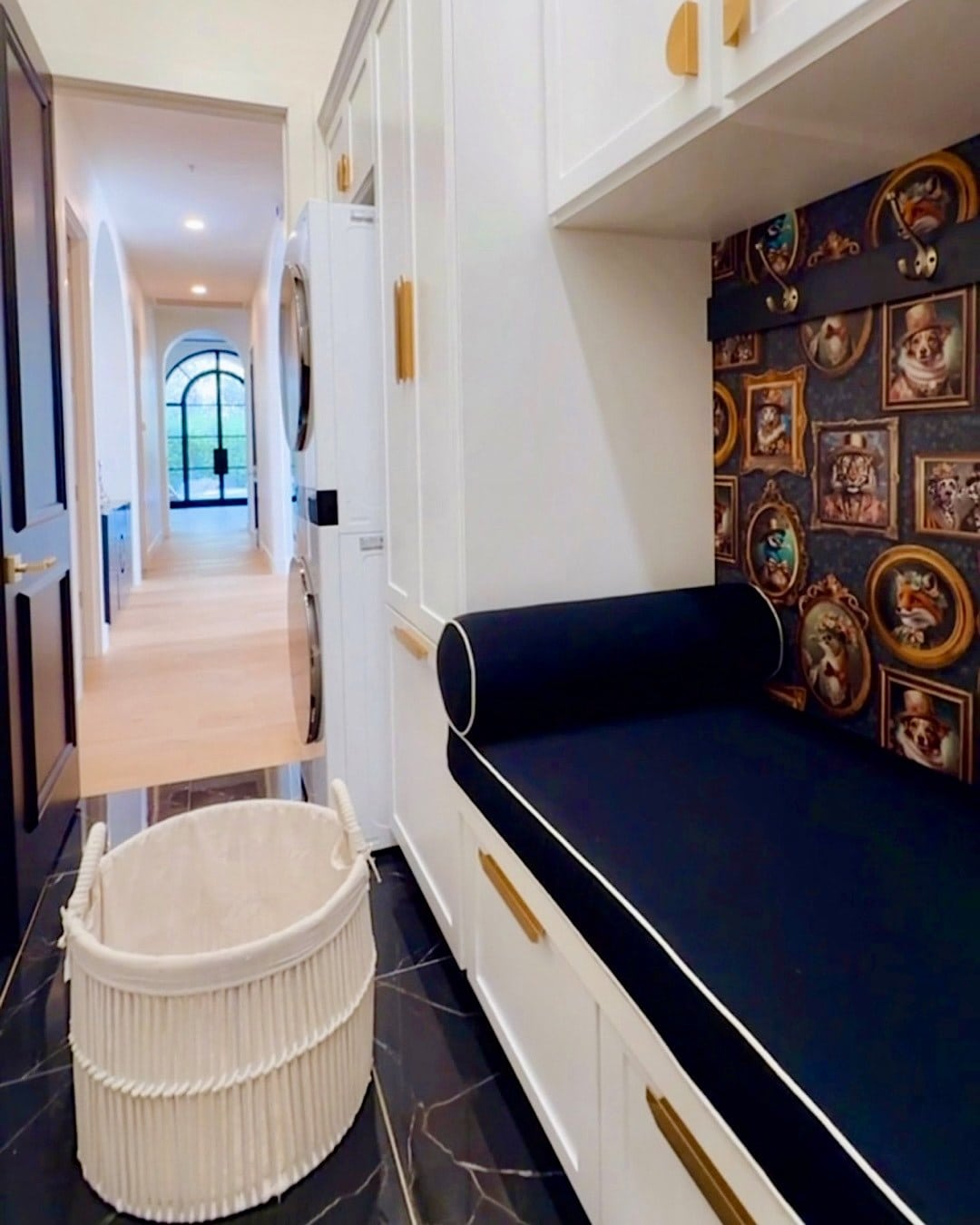 white-laundry-room-cabinets-black-marble-floor
